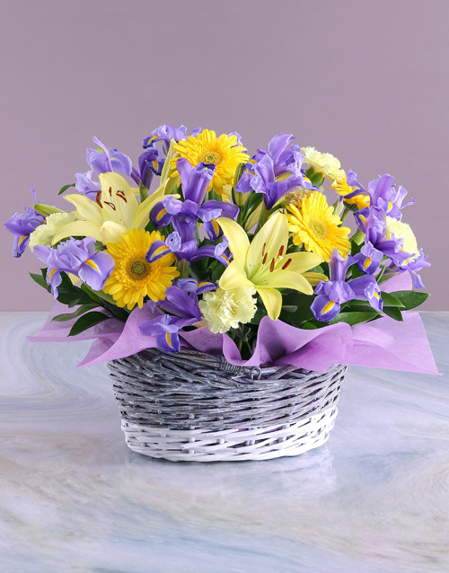 Basket of Blue and Yellow Blooms