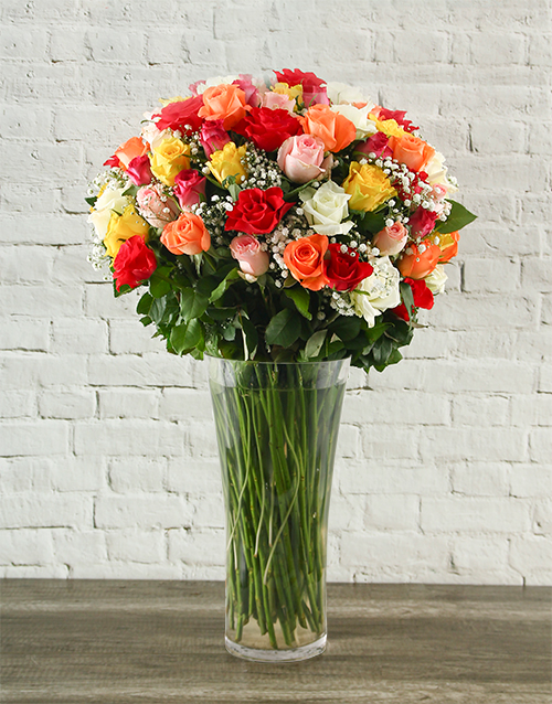 roses 100 Mixed Roses in a Tall Glass Vase