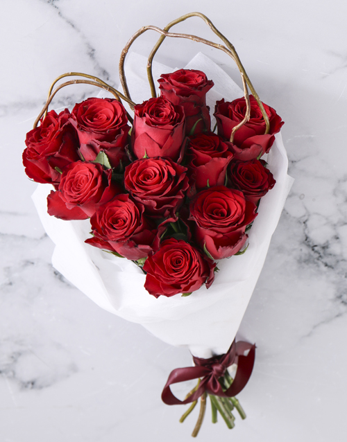 Red Roses In White Wrapping