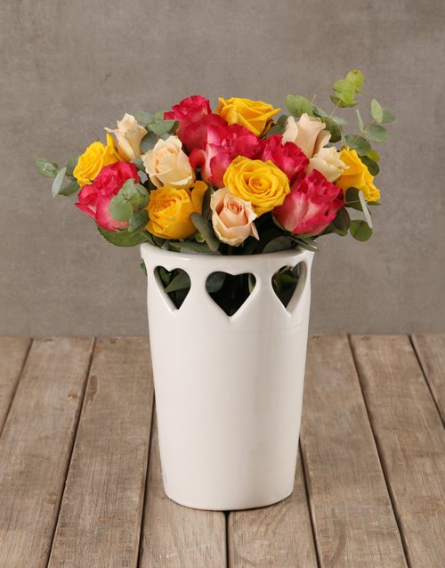 roses Vibrant Blooms in Cut Out Heart Vase