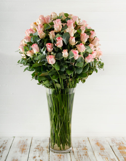 roses 100 Pink Roses in a Tall Glass Vase